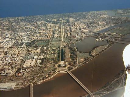 Aerial view of Washington DC<br>Location: <a href="https://www.google.com/maps/search/?api=1&query=38.88817,-77.01987" target="_new">Smithsonian National Air and Space Museum</a>